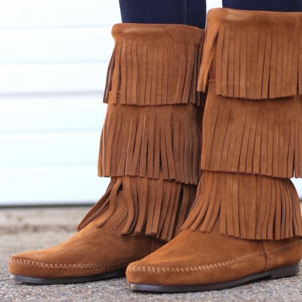 Minnetonka boots. Never worn.